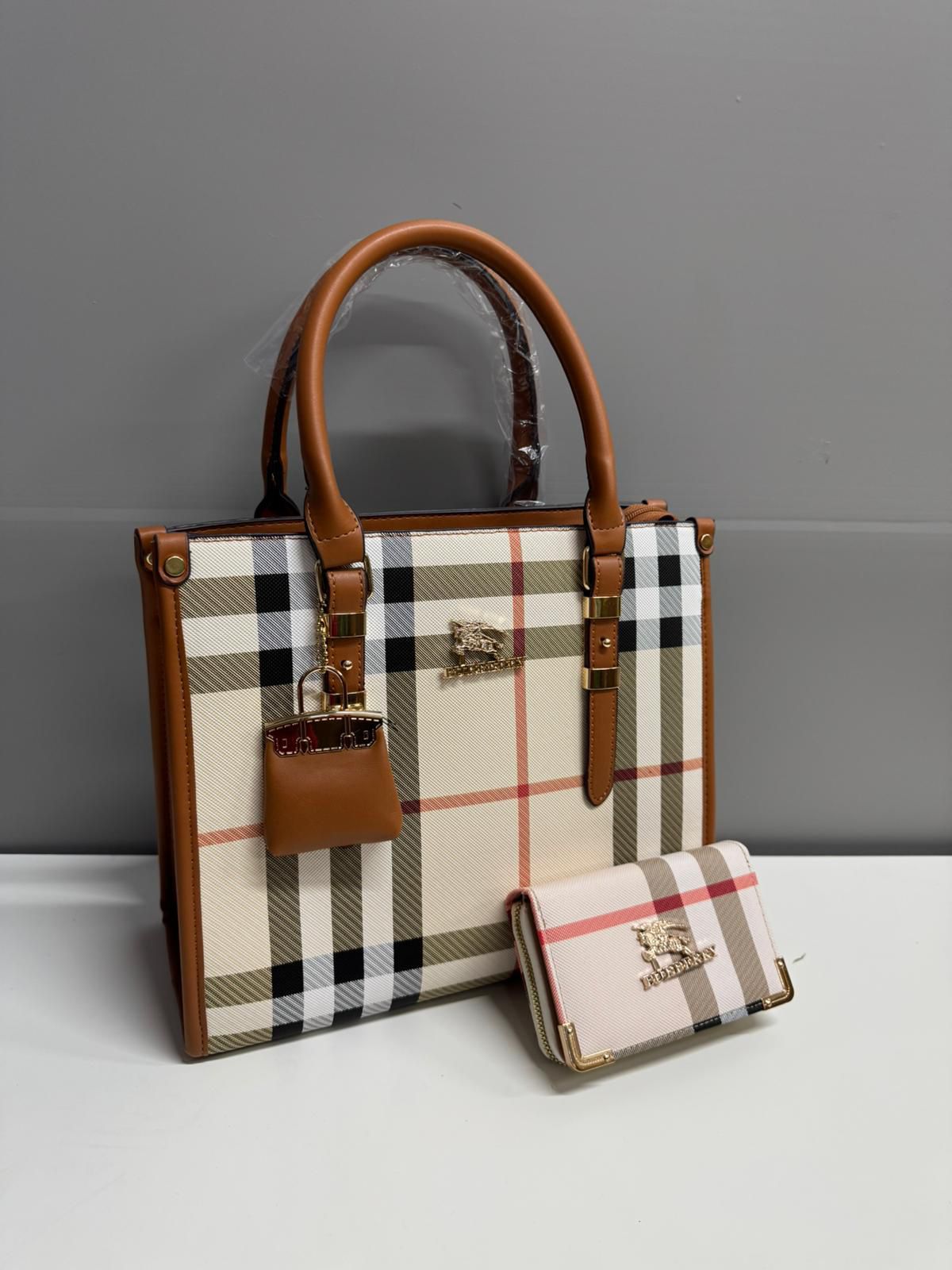 Ladies hand bag with matching clutch